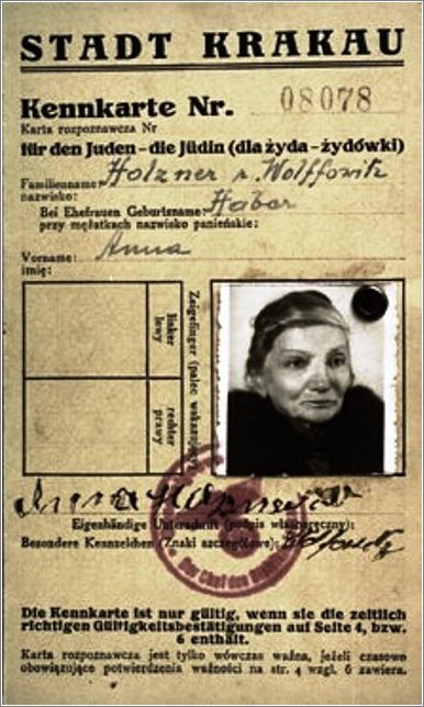 A photo identification card, bearing the official stamps of the Krakow labor office and the General Government
